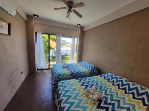 Postel nebo postele na pokoji v ubytování Restaurante y Hostal Romayor