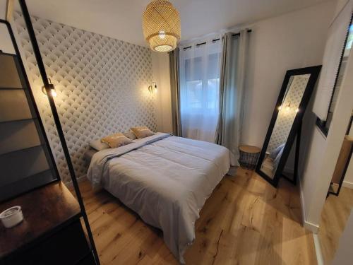 Postel nebo postele na pokoji v ubytování Appartement T2 Frangy