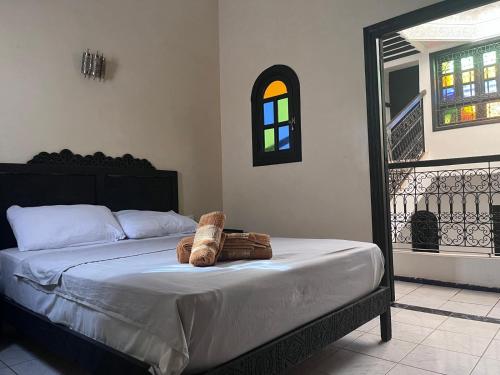 Postel nebo postele na pokoji v ubytování Riad benhamo