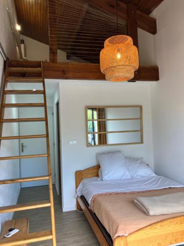 Postel nebo postele na pokoji v ubytování Chambre et sdb avec entrée privative