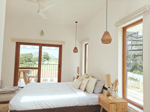 Postel nebo postele na pokoji v ubytování Tuscan Breeze, Nandi Hills