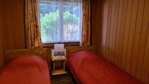 Fotografie z fotogalerie ubytování Chalet Hinkelstein in Beatenberg traumhafte Aussicht auf Eiger, Mönch & Jungfrau v destinaci Sundlauenen