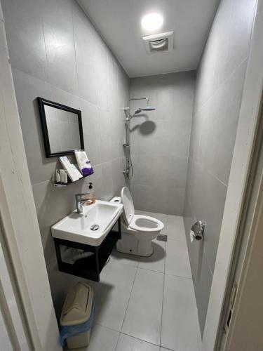 a small bathroom with a toilet and a sink at Furnished Studio at Al Khobar - Near to Rashid Mall in Al Khobar