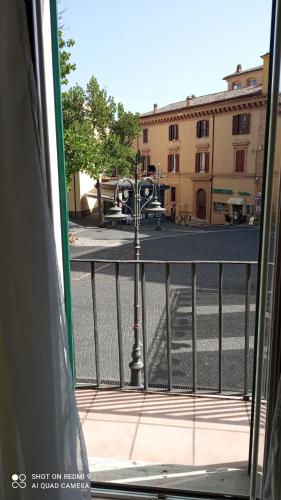 a view of a street from a window of a building at Capital House- Casa Vacanze in Sabina in Poggio Mirteto