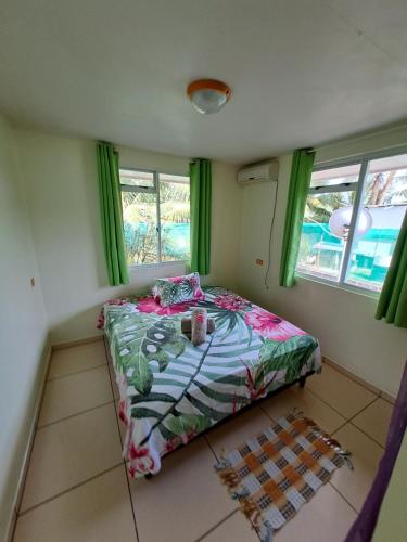 Ein Bett oder Betten in einem Zimmer der Unterkunft Toa Lodge Bora Bora
