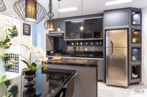 Η κουζίνα ή μικρή κουζίνα στο Apartamento em Itapema