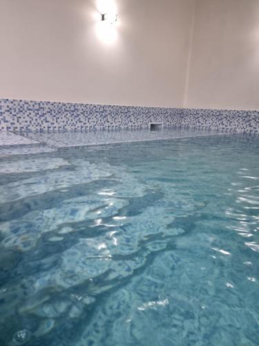 a pool of water with a light on top of it at Susy Rental Depto N 1 in Malargüe
