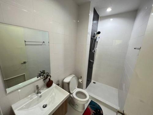 a bathroom with a sink and a toilet and a shower at Self Check in 10min to BKKairport Train2Town Near Mall Local Market WIFI in Bangkok