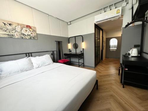 Postel nebo postele na pokoji v ubytování Talakkia Boutique Hotel