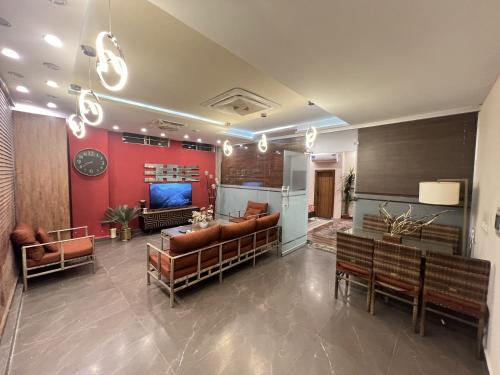 Télévision ou salle de divertissement dans l'établissement Galaxy Hotel & Apartments