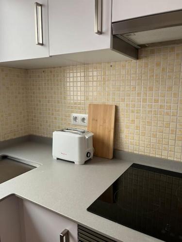 Η κουζίνα ή μικρή κουζίνα στο Apartament sea view and direct beach access
