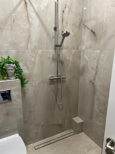 Ένα μπάνιο στο Chic Residence apartament 4