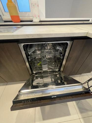 a device is sitting on a shelf in a counter at Duplex Penthouse in Sliema in Sliema