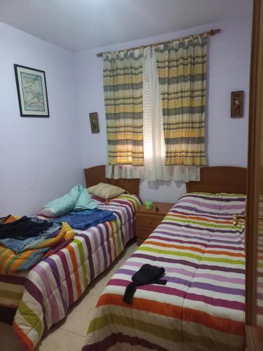 Postel nebo postele na pokoji v ubytování Marina dort Acapulco I primera línea de playa