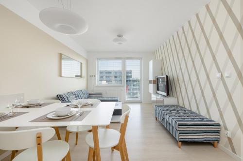 Posteľ alebo postele v izbe v ubytovaní Jantar Apartamenty Bliżej Morza