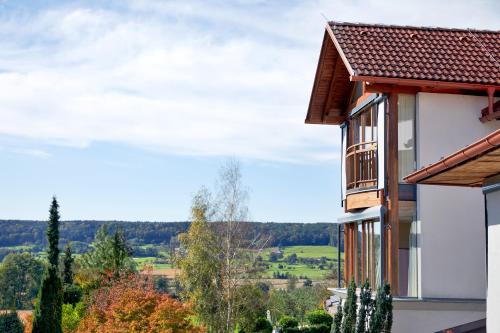 a building with a view of the countryside at Ayurveda Resort MANDIRA in Bad Waltersdorf