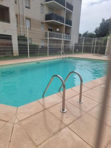 Πισίνα στο ή κοντά στο Un appartement calme et élégant