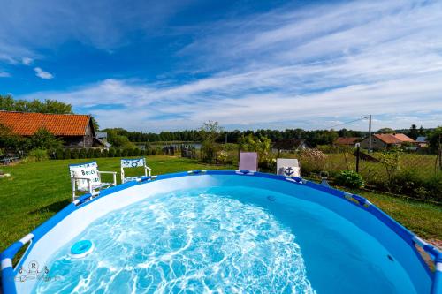 Zacisze Rostken, Wypoczynek na Mazurach, Dom Całoroczny z Prywatną Plażą