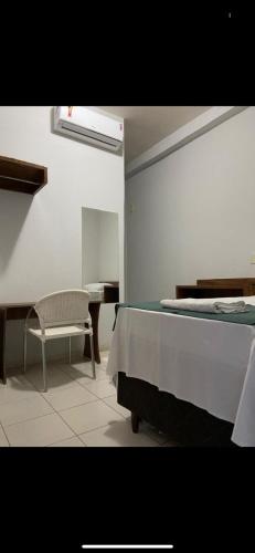 Postel nebo postele na pokoji v ubytování San Felipe Hotel