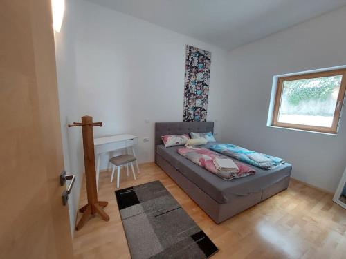 Postel nebo postele na pokoji v ubytování In den Bergen