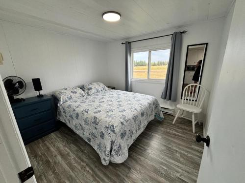 Postel nebo postele na pokoji v ubytování Cottages On PEI-Oceanfront