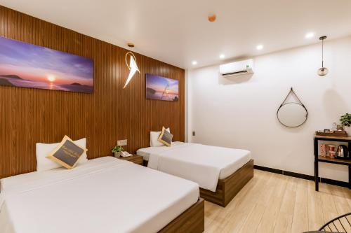 Cama o camas de una habitación en Tuấn Ninh Hotel II