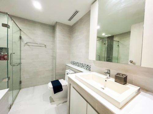 a bathroom with a sink and a shower at Nimman Condo,Mountain View in Chiang Mai