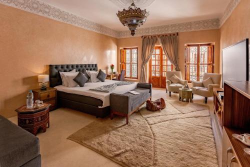 Postel nebo postele na pokoji v ubytování Riad Luciano Hotel and Spa