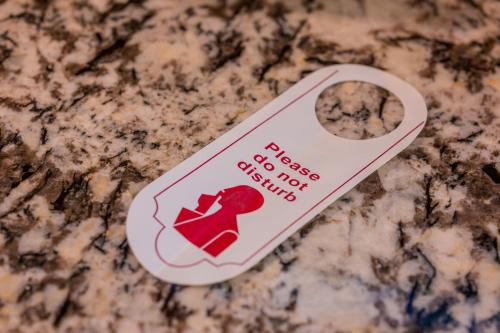 a pin on a counter with a cookie on it at La Oasis by Meraden ,Goa in Anjuna