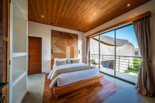 Ένα ή περισσότερα κρεβάτια σε δωμάτιο στο K Club Cemagi no 1