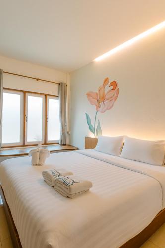 Postel nebo postele na pokoji v ubytování Diamond Beach Resort