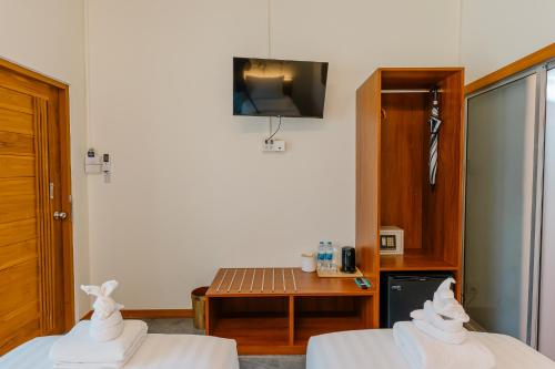 TV a/nebo společenská místnost v ubytování Diamond Beach Resort