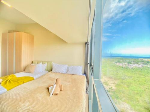 Postel nebo postele na pokoji v ubytování Cozy 2br with pool and beach access