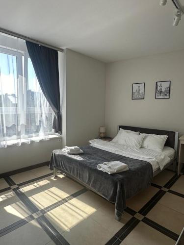 Opera Center Hotel & Apartmentsにあるベッド