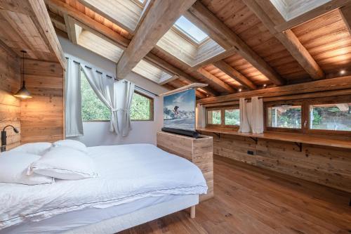 En eller flere senge i et værelse på Chalets ASA 426 m2