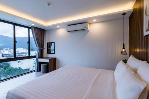 Cama o camas de una habitación en Tuấn Ninh Hotel II