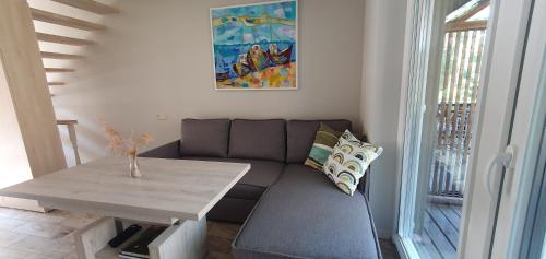 Posezení v ubytování Apartamentas Preila
