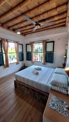 Eco-Hotel Chevere Beachにあるベッド