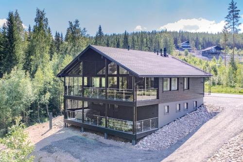 an overhead view of a house with glass at Luxury Villa Himos Hillside in Himos