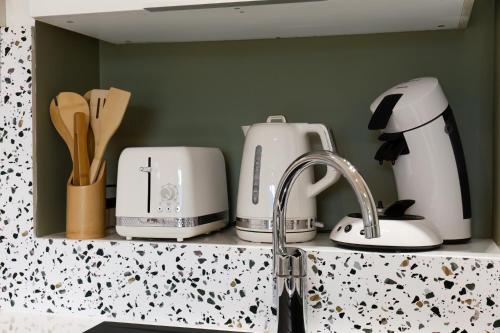 Photo de la galerie de l'établissement Stay&Go des Monts - Centre-Ville - Parking Privé - 20 min du Lac, à Aix-les-Bains