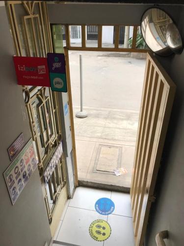 an open door of a building with a sign on it at Hospedaje D Francisco in Lima