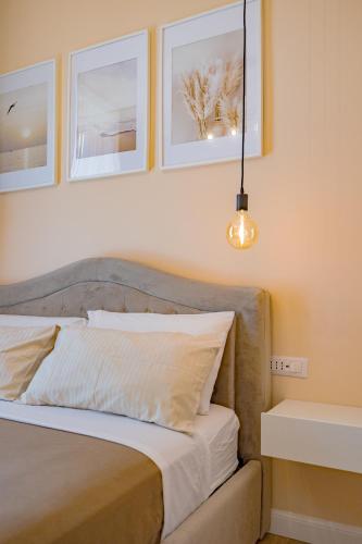 Visconti Palace by Rhospitality itにあるベッド