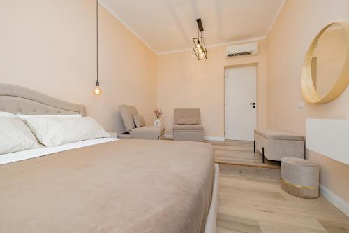 Visconti Palace by Rhospitality itにあるベッド