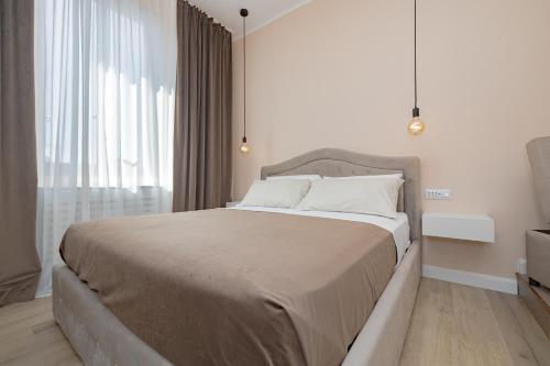 Visconti Palace by Rhospitality itにあるベッド