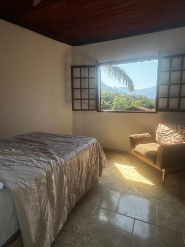 Ένα ή περισσότερα κρεβάτια σε δωμάτιο στο Casa do Soberbo