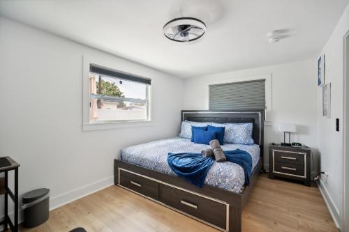 a bedroom with a bed and a window at 3Bd 2Ba House with Parking Laundry and Large Patio in Largo