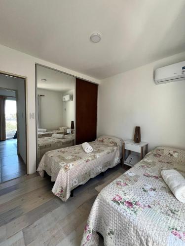Postel nebo postele na pokoji v ubytování Duplex - Doppio I