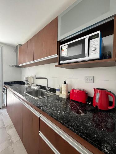 Kuchyň nebo kuchyňský kout v ubytování Duplex - Doppio I