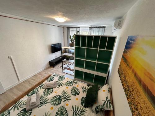 Una cama o camas en una habitación de Apartman Suncokret