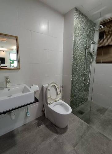 Koupelna v ubytování JazzSuites Vivacity Kuching Home